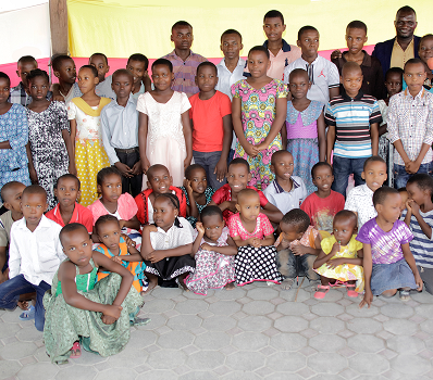 A group photograph of children and young people